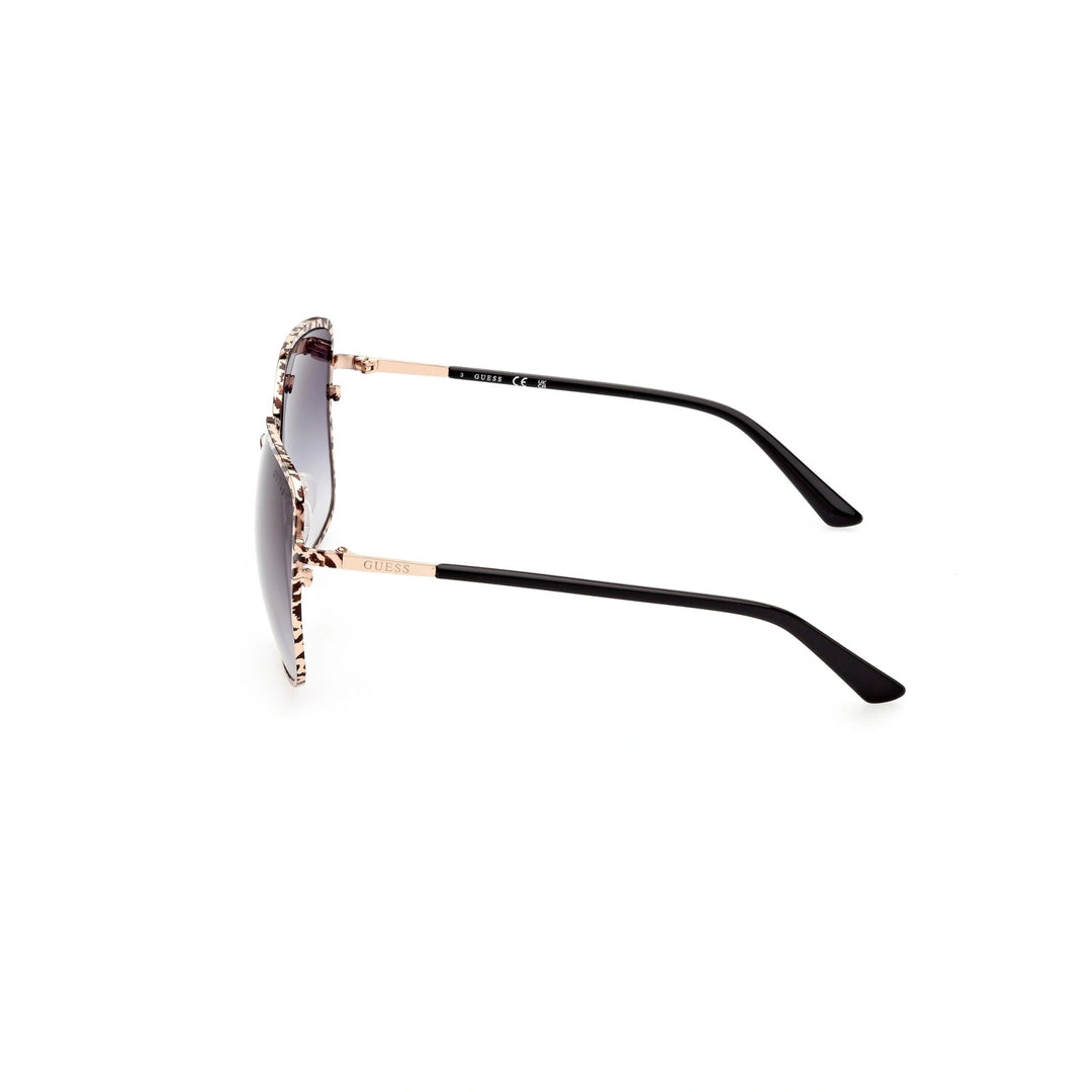 Beige and black patterned square sunglasses with gradient lenses and gold accents on a white background