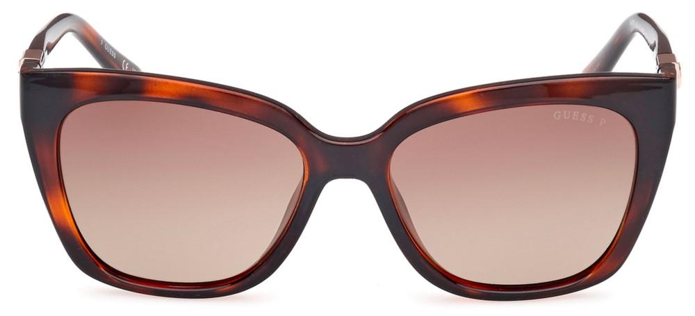 Brown tortoiseshell cat-eye sunglasses with gradient brown lenses and metal temple accents on white background