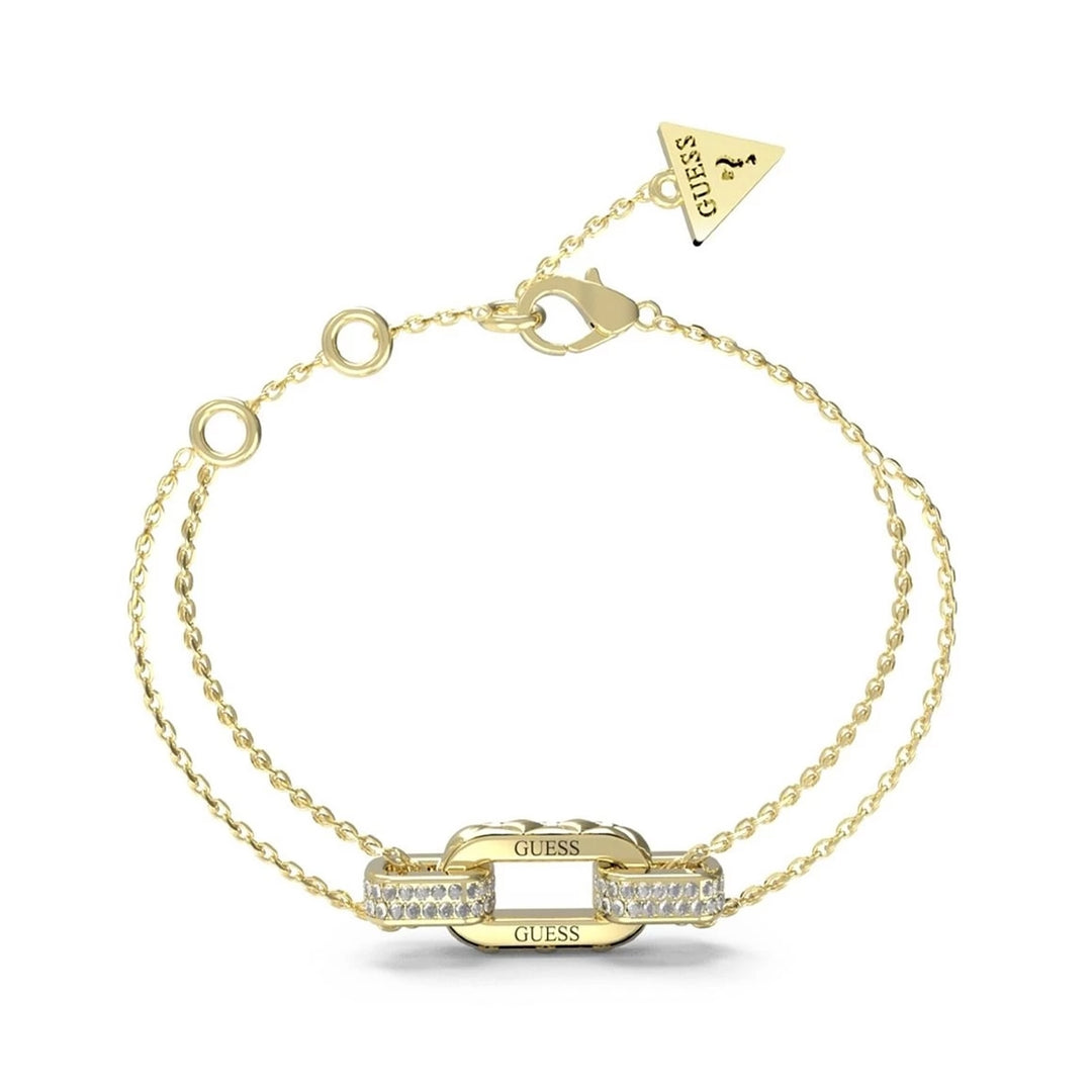 Gold chain bracelet with rectangular stone-set links and small triangle charm on polished clasp