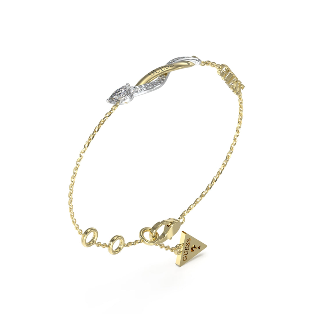 Delicate gold and silver intertwined chain bracelet with small rings and triangular charm on white background