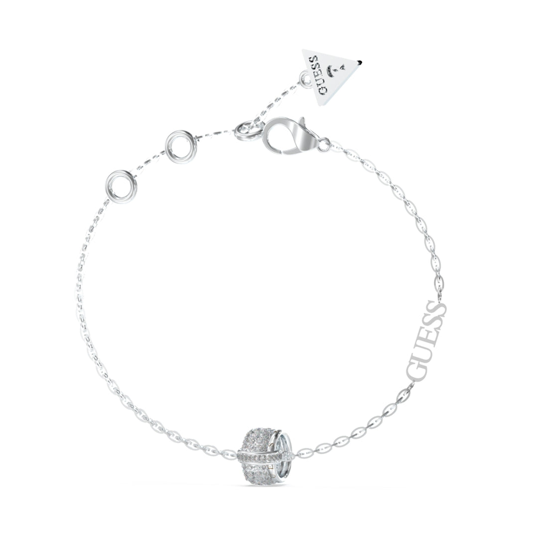 Delicate silver chain bracelet with small logo charm set with stones on wrist