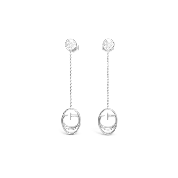 Silver drop earrings: round clear stone stud, chain links, oval pendant on reflective surface
