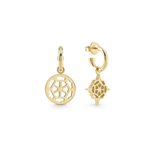 Gold-tone geometric hoop earrings with cut-out pattern and small dangling charm on a white background