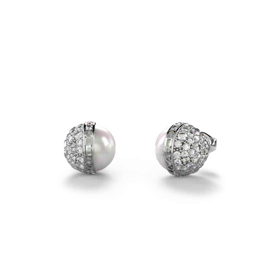 Pair of silver stud earrings with half-sphere pearls and surrounding pave clear gemstones on white background