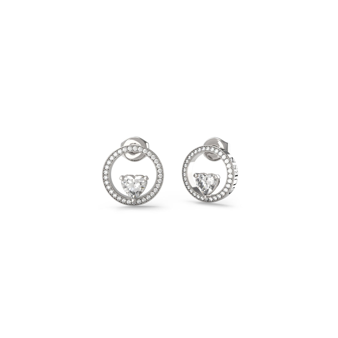 Silver hoop earrings with central heart-shaped stone and pavé-set small stones around circular frame on white background