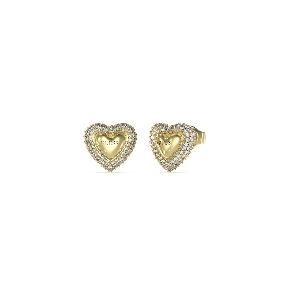 Gold-tone heart stud earrings encrusted with rhinestones on white background, close-up showing sparkle