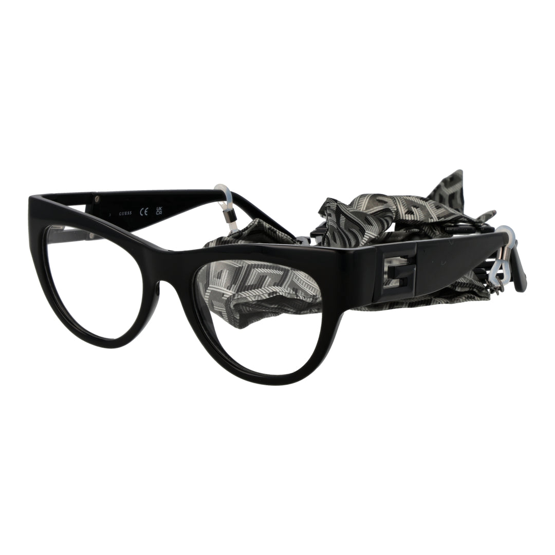 Black cat-eye eyeglasses with clear lenses, decorative 'G' temples and attached patterned fabric strap