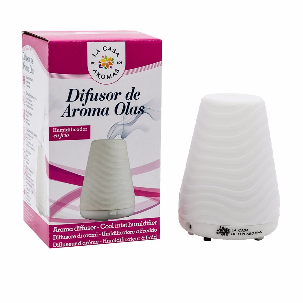 Matte white compact ultrasonic aroma diffuser with soft curved silhouette and power cable