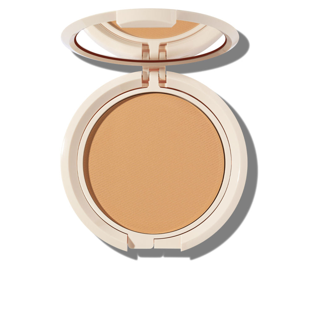 10 g compact tinted SPF 50+ cream in warm bronzed shade, water‑resistant